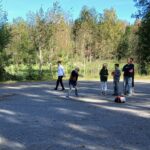 Frisbeen heittoa (tietokoneleiri)